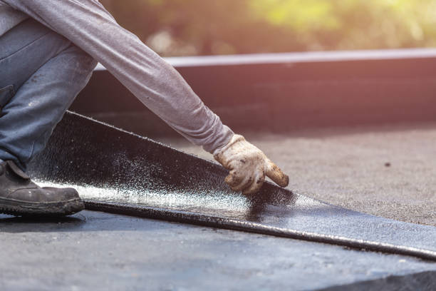 Professional Waterproofing technician working in West Lebanon, IN
